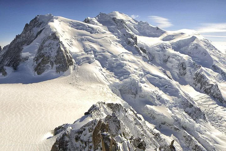 Massive snowy mountain peak and glacier on Monte Bianco